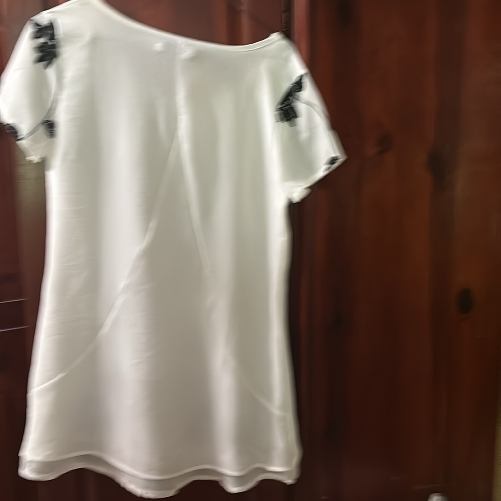 White top with black embroidery